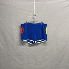 Large / 1970s Kmart Running Sprinter Blue/Red/Yellow 2" Inseam Vintage Shorts Waist: 16in + Stretch Length: 13in Inseam: 2in Check photos before purchasing! ITEM IS SECONDHAND! Please take the time to review our shop policies listed on our homepage before purchasing. We do NOT accept returns, but will gladly accept exchanges. All items are vintage, and sold AS IS. Thank you for shopping with us! - RatRunners Retro Multicolor Color Block Bottoms, Retro Color Block Bottoms For Summer, Fitted 90s Blue Shorts, 1970s Style Blue Bottoms For Spring, Fitted Blue 1970s Style Bottoms, Fitted 1970s Style Blue Bottoms, 1970s Style Fitted Blue Bottoms, Blue Color Block Cotton Shorts, Blue Cotton Color Block Shorts