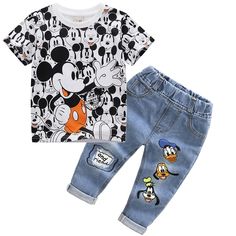 Minnie Mickey Kids 2Pc Set T-shirt + Jeans Elevate your child's summer style with this adorable Minnie Mickey Mouse 2-piece clothing set. Crafted for comfort and cuteness, this set includes a charming cartoon-themed T-shirt paired with trendy jeans pants. Ideal for both baby girls and boys, this tracksuit ensemble ensures your little one is fashion-forward and ready for any adventure. Whether it's a playdate or a family outing, this summer outfit is a must-have addition to your children's wardro Cute Cotton Sets With Character Print, White Matching Sets For Summer, White Matching Summer Sets, Casual Cotton Sets With Cartoon Print, Casual Cotton Sets With Character Print, Spring Character Print Short Sleeve Sets, Playful Summer Sets With Character Print, Spring Short Sleeve Sets With Character Print, White Character Print Summer Sets