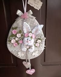 an easter decoration hanging on the front door