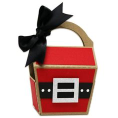 a red and black box with a bow on the top that is decorated like a chest