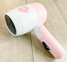 The perfect piece for your little ones makeup collection. Whether she watches you do your hair or is fascinated by hair accessories and products. SAFE TO USE: This hair dryer does not plug in and does not heat up! Does not blow air or make noise.  However it does have an on off switch so they feel like it's real!   Just the blow dryer no accessories Hair Dryer Caddy, Blow Dryer Hair, Mini Hair Dryer, Steam Hair Straightener, Pretend Makeup, Mini Hair Straightener, Hair Steaming, Hair Tool Organizer, Hair Spray Bottle