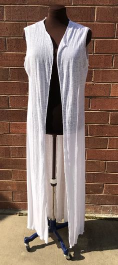 Cream, linen long duster Fits size: xs-m Summer Linen Cardigan For Layering, Casual Long Cover-up For Daywear, Casual Long Daywear Cover-up, Long Casual Summer Duster, Casual Long Duster For Summer, Casual Long Summer Duster, Long Cotton Cover-up For Spring, Casual Long Spring Duster, Casual Long Duster For Spring