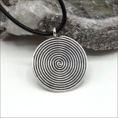 Hill Tribe Silver spiral pendant measures 23mm around. All measurements do not include ring. Due to the nature of the handmade process, sizes can vary slightly. Always check sizes! Package of 1. ABOUT HILL TRIBE SILVER Each bead, pendant and toggle is handmade by the Karen Hill Tribe people using traditional ancient methods passed down for generations. Their kind and gentle spirit makes their silver extra special. Each piece is individually crafted; therefore, the designs and weights will vary slightly reflecting its unique nature. The silver content of each piece ranges from 95%-99% as compared to sterling silver, which is 92.5% pure. CARE OF YOUR HILL TRIBE SILVER Keeping your Hill Tribe silver looking shiny & new is easy.  We use Connoisseurs disposable silver wipes (we have no affiliat Gentle Spirit, Spiral Pendant, Hill Tribe Silver, Bead Pendant, Unique Nature, Silver Lights, Tube Beads, Simple Necklace, Bead Crafts