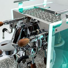 an espresso machine sitting on top of a counter