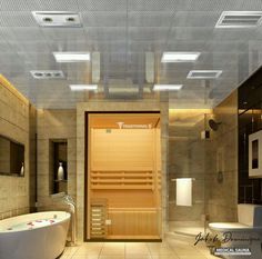 a bathroom with a tub, toilet and sink in it's own area that is lit up by recessed lights