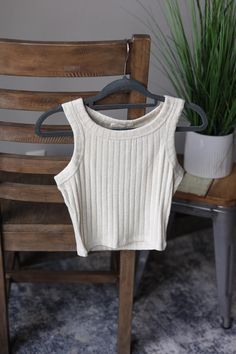 Meet your go-to top layering tank for less bulk - our Sand Beige Ribbed Cropped Tank Top! Its comfortable ribbed design makes it perfect for layering under wide neck tops without adding bulk. The Fit of This Boutique Top: See HOW TO MEASURE Here. Flat Across Measurements in Inches Size: Chest Across Waist Across Length Small 14 11 16 Medium 15 12 17 Large 16 13 17 X-Large 2XL Winter Skirt Outfits, Top Layering, Casual Mom Style, Style For Fall, Outfits Modest, Winter Skirt Outfit, Long Denim Skirt, Comfy Chic, Winter Skirt