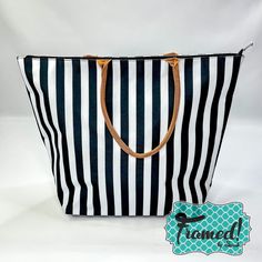 Our Havana Stripe Bag is ideal for everyday items or to pack up your stuff for a weekend away! This tote is made of durable polyester and designed with easy-to-carry handles. It also features an interior lining and exterior zipper pocket. Measuring 22.5" L x 8" W x 17" H, it's lightweight, stylish, and perfect for toting ALL the things. Add your monogram for just $8 more to make it yours! Travel Tote Lunch Bag With Zipper Closure, Trendy Tote Lunch Bag For Travel, Travel Shoulder Lunch Bag With Removable Pouch, Travel Lunch Bag With Removable Pouch, Travel Beach Bag Tote With Zipper Closure, Travel Tote Beach Bag With Zipper Closure, White Bags With Luggage Sleeve For Everyday Use, Large Capacity Pouch Lunch Bag For Travel, Rectangular Beach Bag With Zipper For Everyday