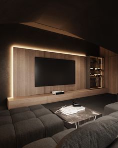 a living room with couches and a flat screen tv mounted on the wall above it