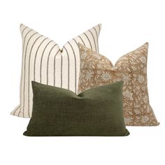 three pillows in different colors and patterns