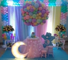 a birthday party with balloons and decorations