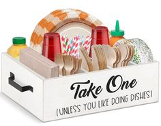 a wooden box filled with plates and cups