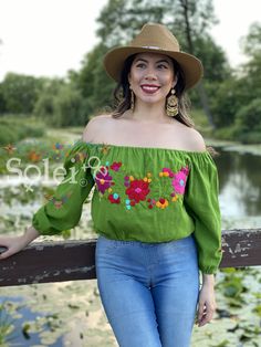 This Beautiful Off the Shoulder Crop Top is the perfect Top for a fun day out. It's made out of cotton and has hand embroidered flowers on the front and on the sleeves. Please note: This blouse comes in one size which fits sizes Small and Medium. This blouse is hand embroidered and the embroidered colors vary on each blouse making each blouse one of a kind. More colors available here: https://www.etsy.com/es/listing/726742179/crop-top-floral-hermosa-blusa-bordada-a?ref=listings_manager_grid Purc Cotton Peasant Top For Fall Vacation, Cotton Peasant Top For Vacation In Fall, Fall Cotton Peasant Top For Vacation, Summer Embroidered Blouse For Day Out, Spring Embroidered Green Blouse, Spring Cotton Peasant Top With Relaxed Fit, Floral Embroidered Peasant Top For Summer, Summer Peasant Top With Floral Embroidery And Relaxed Fit, Summer Floral Embroidery Peasant Top Relaxed Fit