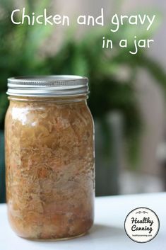 a jar filled with chicken and gravy in a jar