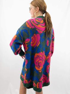 This Oversized Floral Cardigan is in a delightful palette of hunter green, pink, blue, and orange hues. It features a charming floral pattern and comes in an oversized fit for a cozy and stylish look. With the added convenience of pockets, it's the perfect combination of fashion and functionality. Pair it with leggings or a t-shirt dress. SIZE & FIT Oversized fit Model is 5'6" wearing size small Casual Multicolor Floral Print Cardigan, Casual Oversized Floral Print Cardigan, Oversized Casual Cardigan With Floral Print, Oversized Floral Print Sweater, Bohemian Floral Print Sweater For Fall, Multicolor Floral Print Long Sleeve Cardigan, Bohemian Floral Print Winter Sweater, Vintage Floral Print Cardigan For Fall, Vintage Floral Print Winter Cardigan