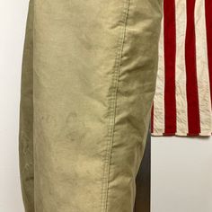 "Vintage United States Navy overalls. Light green fabric. Wool lined. Adjustable straps. Zip closure with button overlay. Four pockets: two at the waist, two on the booty. Straps on ankles to button tighter. USN marking on chest. Measurements (taken flat) ~ Size: large Length (top of chest to ankle): 50\" Chest: 22\" Waist: 24 1/2\" Inseam: 28\" PLEASE READ Condition: good Age appropriate signs of wear throughout. Some light staining. Zipper is broken/torn a couple inches from bottom of fly. Top Fitted Utility Pants With Button Closure, Fitted Khaki Cargo Pants With Belt Loops, Military-style Fitted Bottoms With Side Pockets, Full Length Military Cotton Bottoms, Military Style Fitted Bottoms With Side Pockets, Fitted Military Bottoms With Side Pockets, Fitted Military Style Bottoms With Side Pockets, Utility Style Khaki Bottoms With Button Closure, Utility Style Khaki Bottoms With Buttons