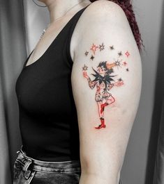 a woman with a tattoo on her arm