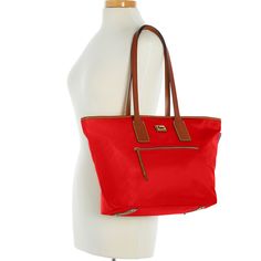 Sporty and Classic    This sporty classic holds everything you need for the morning commute or extra clothes for a trip to the gym. All-weather nylon, Vacchetta leather trim, and heritage details exude signature all-American style. Red Nylon Shoulder Bag, Red Nylon Shoulder Bag With Zipper Closure, Red Nylon Shopping Bag, Classic Red Coated Canvas Shoulder Bag, Classic Red Bags With Leather Trim, Classic Red Shoulder Bag For Travel, Red Shoulder Bag With Zipper For Travel, Red Leather Trim Satchel Bag, Casual Red Bag With Luggage Sleeve