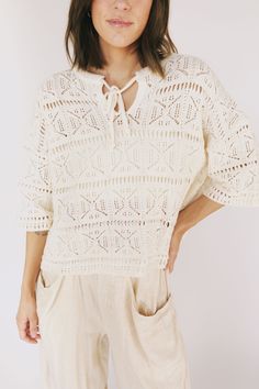 Find your perfect match with this charming cream-colored top. Featuring a crochet pattern and a front tie, this top offers a slight oversized fit for a comfortable and stylish look. Don't wait any longer - the Finally Found You Top is the missing piece to your wardrobe! Details Crochet pattern Front tie Slight oversized fit Cream color Sizing Approximate measurements: SIZE LENGTH BUST Small 22" 52" Medium 23" 54" Large 23.5" 58" Fabric has stretchModel is 5’8” wearing small Material 60% Cotton 4 Cream Cotton Crochet Top For Vacation, Cream Cotton Knit Top For Day Out, Bohemian Pointelle Knit Top For Day Out, Cream Bohemian Knit Top For Spring, Neutral Pointelle Knit Top For Spring, Cream Knit Top For Vacation, Spring Neutral Pointelle Knit Tops, Spring Cream Crochet Cotton Top, Cream Relaxed Fit Blouse For Vacation