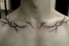 a man's chest with barbed wire on it