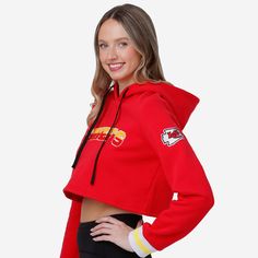 Stand out at the tailgate. Catch the eye of the jumbotron. Or just be the best-dressed fan in the crowd. Because the Kansas City Chiefs Women's Cropped Chenille Hoodie is here for you all gameday long. Features All-over, team-colored design so you can rep the team in style Bold team name display with chenille texture on chest, in case there were any doubts where your allegiances lie Team logo display with chenille texture on left sleeve for a little extra team spirit Team-colored stripe accent o Game Day Sports Fan Hoodie For Winter, Game Day Sports Fan Winter Hoodie, Game Day Winter Sports Fan Hoodie, Winter Game Day Sports Fan Hoodie, Sports Fan Long Sleeve Hoodie For Winter, Winter Long Sleeve Sports Fan Hoodie, Team-colored Hooded Top For Game Day, Hooded Tops For Game Day In Winter, Hooded Winter Tops For Game Day