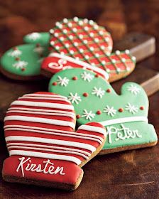 three decorated cookies on a table with the words happy kresten weekend