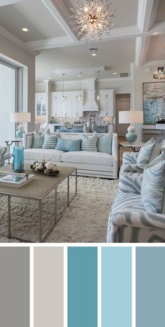 a living room filled with furniture and lots of blue color in the middle of it