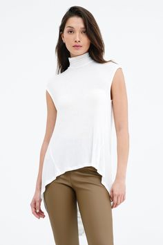 Our Vivienne Top will bring casual glamour to your wardrobe. Remixing the silhouette of our best-selling Halle Tunic for warmer temps, she begins with a turtleneck, drapes into an open cowl back and finishes with a dynamic high-low hem. Sleeveless and fashioned from silky soft, sheer European jersey, Vivienne's designed to move in free-flowing rhythm with you no matter the setting.[SPLIT] Yada, in off white, is 5'9" (175 cm) tall, wearing size XS. Astrid, in pink, is 5'9" (175 cm) tall, wearing Chic High Neck Mock Top For Layering, Versatile Mock Neck Top For Layering, Chic Mock Neck Top For Fall Layering, Chic Spring Turtleneck, Chic Mock Neck Top For Layering, Chic Mock Neck Turtleneck Top For Layering, Versatile Turtleneck For Layering, Versatile Funnel Neck Turtleneck For Spring, Flowing Rhythm