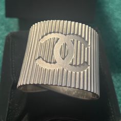 Cc Chanel Logo Ridged Crossover Cuff Bracelet Includes Designer Box And Felt Box Like New - Worn 3 Times Excellent Condition From The Summer 2016 Collection By Karl Lagerfeld Metal Type: Palladium-Plated Made In Italy Chanel Logo, Chanel Jewelry, Summer 2016, Karl Lagerfeld, Womens Jewelry Bracelets, Cuff Bracelet, Crossover, Types Of Metal, In Italy