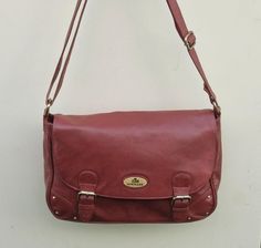 Vintage Rowallan dark red / burgundy leather satchel messenger bag, long cross body shoulder strap;  Classic satchel styling with buckle detailing to the front with magnetic snap for ease of closure.  Long adjustable length cross body shoulder strap.  Inside lined in red material which does have a little catching near the zip pocket (shown in the photo)  there are also two leather trimmed pouch pockets, lining is clean.  The overall condition of the bag is very good, no major scuffing or damage. Burgundy Satchel Flap Bag With Detachable Strap, Burgundy Crossbody Flap Bag With Adjustable Strap, Classic Burgundy Shoulder Bag With Adjustable Strap, Classic Burgundy Satchel Shoulder Bag, Burgundy Rectangular Satchel With Adjustable Strap, Burgundy Satchel With Detachable Strap, Burgundy Soft Leather Shoulder Satchel, Burgundy Flap Bag With Detachable Strap For Everyday Use, Burgundy Flap Shoulder Bag For Everyday Use