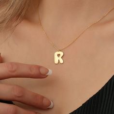 Unveil the poetry in every moment with our exquisite Custom Love Letter Necklace. Imbued with the timeless allure of 14K gold plating on 925 sterling silver, each piece is more than jewelry; it's a reflection of the sentiments that echo within the chambers of the heart 💖 Crafted for Meaning: Personalize this piece with a chosen initial, turning a simple accessory into a treasure trove of emotions. The 14K Gold Heart Initial Pendant is not just a symbol; it's a testament to the unique connection Anniversary Initial Necklace With Custom Name, Anniversary Initial Pendant Necklace With Custom Name, Personalized Initial Pendant Necklace, Anniversary Custom Name Initial Necklace, Elegant Initial Letter Necklace With Name, Minimalist Initial Pendant Necklace With Heart Charm, Elegant Letter-shaped Initial Necklace, Elegant Initial Pendant Necklace For Mother's Day, Personalized Heart Pendant Initial Necklace