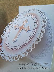 a white card with a cross on it and doily around the edge that says, for classy cards in such