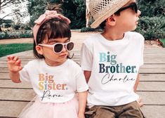 "🌈 Celebrate the Bond of Brotherhood with our Strikingly Stylish \"Big Brother\" and \"Little Brother\" Shirts! 🌟 Introducing our captivating Siblings Kids Custom Tee collection, thoughtfully designed in mesmerizing hues of blue, forming a delightful rainbow of colors for each letter! This eye-catching typography design will make your little one stand out and express their special role as either the \"Big Brother\" or \"Little Brother\" with pride. Plus, for that extra touch of personalization, you can add their name beneath the endearing \"Brother\" title! 👬 A Perfect Set for the New Brother: Welcoming a new member to the family is a momentous occasion, and our Matching Sibling T-shirts make it even more memorable! Whether it's for a first birthday celebration or simply to honor the sp Big Brother And Sister Shirts, Big Bro Shirt, Big Brother T Shirt, Big Sister Little Brother Aesthetic, Big Sister Big Brother Shirts, Big Brother Little Sister, Big Brother Tshirt, Gender Reveal Shirts, Big Brother Shirt