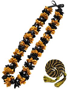 two black and yellow bows are attached to a necklace with a tassel on it