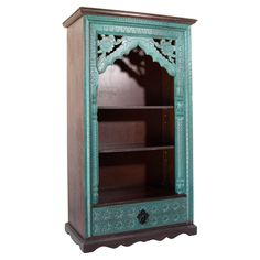 an ornate wooden bookcase with green paint and carvings on the front, against a white background