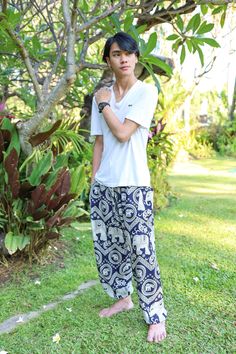 DARK BLUE ELEPHANT Harem Pants Men Comfy Bohemian Trousers for Festival Baggy Beach Summer Boho Clothes Lannaclothesdesign dark blue elephant printed harem pants with drawstring waist are handmade with rayon fabric. This ultra light weight fabric makes the harem pants super comfy to wear. They comes with comfortable elastic waist and ankles. Also drawstring in pants color. The two pockets are good size enough to fit an iPhone. These harem trousers are are perfect for relaxing at home, working ou Casual Blue Harem Pants For Summer, Casual Harem Bottoms For Beach, Casual Harem Pants For Beach Festival, Casual Harem Yoga Pants For Summer, Casual Summer Harem Yoga Pants, White Bohemian Harem Pants For Yoga, White Bohemian Yoga Pants, White Bohemian Harem Pants For Vacation, Bohemian Blue Pants For Beach Season