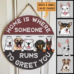 a sign that says, home is where someone runs to greet you with dogs on it