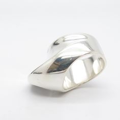 925 Sterling Silver Vintage Spain Modernist Concave Ring Size 7 1/4 Weight: 17.1g WELCOME TO PAWN SHOP We are an actual pawn shop and have been in business for over 25 years. Since 1990, our establishment has been serving a variety of clients by providing them with short term cash solutions and options of liquidity regarding their treasured heirlooms. Acknowledging that today′s customers are very sophisticated and are looking for a variety of investments, our acquisitions are hand-picked for our Classic Wide Band Open Ring Stamped 925, Collectible Sterling Silver Ring With Wide Band, Classic Sterling Silver Bypass Ring, Modernist Wide Band Rings For Anniversary, Silver Wide Band Rings For Collectors, Classic Silver Bypass Ring With Open Band, Classic Silver Open Band Bypass Ring, Swirl Ring, Bypass Ring