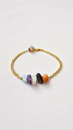 Ignite your Aries spirit with this bold and empowering zodiac gemstone bracelet! Designed for those born under the sign of the Ram (March 21 - April 19), this bracelet features a vibrant blend of Aquamarine, Amethyst, Citrine, Jasper, and Carnelian gemstones known to resonate with Aries's fiery energy, adventurous spirit, and courageous heart.This Aries zodiac bracelet is the perfect way to embrace the magic of your astrological journey. Order yours today and let your Aries spirit blaze!This bra Spiritual Amethyst Beaded Birthstone Bracelet, Spiritual Healing Crystal Bracelet With Birthstone, Amethyst Birthstone Bracelet For Healing, Spiritual Amber Crystal Bracelet With Gemstone, Spiritual Amber Crystal Gemstone Bracelet, Amber Gemstone Bracelet For Healing, Spiritual Chain Bracelet As Gift, Friendship Gemstone Crystal Bracelet, Friendship Crystal Gemstone Bracelet