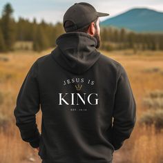 "Jesus is King hoodie - Design is printed on the back, the front is blank. Gildan high quality and super soft, comfortable sweatshirts and hoodies. Made with top of the line vinyl and pressed with a professional grade heat press. How to Order: * Please, check and review all the photos. * Choose your T-shirt size and color. * Different styles of shirts may have different shades of same color choice due to different manufacturer brands. * Click add to cart. You can go back to add more shirts. * For multiple items go back to the listing and repeat the steps. * Click \"Proceed to check out\". Material/Fit * 50% cotton, 50% polyester * Medium-heavy fabric (8.0 oz/yd² (271.25 g/m * Loose fit * Sewn-in label * Runs true to size Washing Instructions: * Turn inside out. * Machine wash cold. * Tumbl Christian Hoodies, Christian Sweatshirt, Trendy Collection, Hoodie Design, Mens Sweatshirts, Hoodies Men, Sweat Shirt, Shirt Designs, Bible Verses