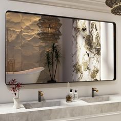 a bathroom with two sinks and a large mirror on the wall above it that has a bathtub in front of it