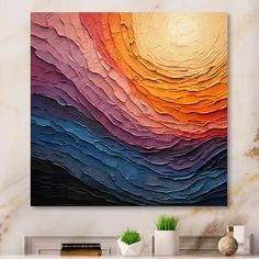 an abstract painting on the wall in a living room