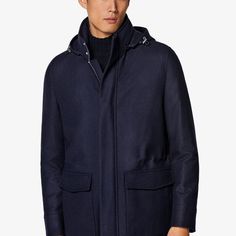 A richly layered
  piece made to keep you warm in luxury, this navy parka
  puts a tailored spin on a classic winter layer and brings adaptable features
  like a removable inner layer and cinching drawstring Luxury Navy Wool Outerwear, Luxury Parka With Detachable Hood For Cold Weather, Classic Parka With Detachable Hood For Fall, Classic Fall Parka With Detachable Hood, Navy Double-lined Hooded Outerwear For Fall, Navy Outerwear With Detachable Hood For Cold Weather, Fall Navy Hooded Jacket With Detachable Hood, Classic Parka With Detachable Hood For Cold Weather, Navy Hooded Jacket With Detachable Hood For Winter