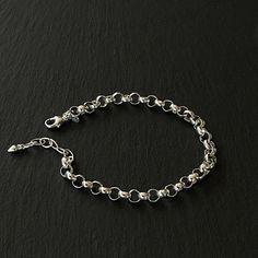 Details: Chain: Sterling Silver Rolo Chain, 6.3mm, plus 1 inch of extension chain Clasp: Sterling Silver Lobster claw clasp Sizes: 5/6 inches, 6/7 inches, 7/8 inches, 9/10 inches Shipping: Ready to ship within one business day Complimentary shipping in the USA Complimentary gift wrap Modern Rolo Chain Link Bracelet, Modern Link Bracelet With Rolo Chain, Modern Round Charm Bracelet With Chain, Everyday Charm Bracelet With Rolo Chain, Modern Round Chain Charm Bracelet, Modern Chain Charm Bracelet, Metal Link Bracelets With Rolo Chain, Classic Round Chain Bracelet With Extender, Chain Link Bracelets For Jewelry Making