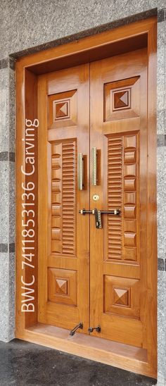 two wooden doors with decorative designs on them