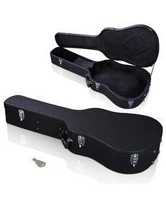 an empty guitar case sitting on top of a white surface