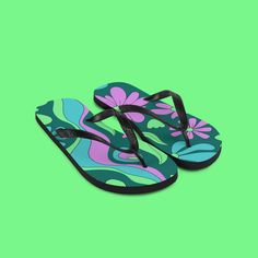 Embrace the summer vibes with these unisex flip flops featuring a stunning floral pattern set against refreshing mondegreen colors. Ideal for beach outings, garden strolls, or festival hopping, these flip flops blend comfort with the natural beauty of floral designs. Their eye-catching look makes them a perfect accessory for any relaxed or outdoor ensemble, ensuring you step out in style and comfort. Lightweight yet durable, these flip flops are essential for your summer adventures. * Rubber sole * Customizable 100% polyester fabric lining * Black Y-shaped rubber straps * Toe post style Green Non-slip Flip Flops For Vacation, Green Non-slip Casual Flip Flops, Non-slip Green Flip Flops For Vacation, Green Casual Flip Flops For Vacation, Comfortable Summer Beach Flip Flops, Comfortable Beach Flip Flops For Summer, Casual Green Flip Flops For Vacation, Casual Green Non-slip Flip Flops, Blue Sandals For Spring Poolside