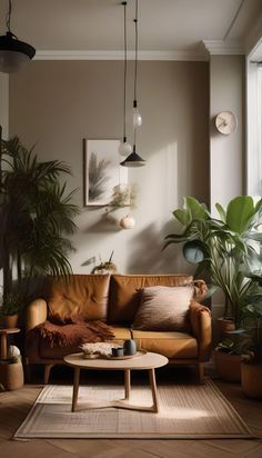 a living room filled with furniture and plants