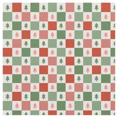 a checkered pattern with christmas trees on the bottom and green, red, and white squares