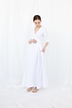 Boho Wedding Dress, Linen Wedding Dress, White Linen Dress D E S C R I P T I O N * Wrap around linen dress * Elegant V-shaped neckline * 3/4 sleeves * Side seam pockets * Wide skirt D E T A I L S * Sizes: XS - XXL * 100% European soft and washed linen fabric (weight 206 g/m² | 6.49 oz/yd²). Fabric is woven according to universally accepted quality requirements, which correspond to OEKO-TEX® Standard 100 certified. Y O U R - S P E C I A L - W I S H E S I can make the following adjustments upon yo White Linen Long Sleeve Maxi Dress, White Unlined Linen Maxi Dress, Elegant Linen V-neck Maxi Dress, Wedding Dress Linen, Linen Dresses Elegant, White Bridal Dress, White Linen V-neck Maxi Dress, White V-neck Linen Beach Dress, White Linen Dress