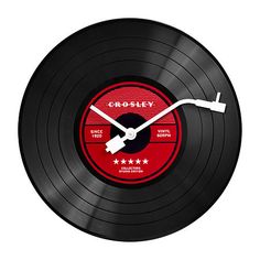 a record clock with the word crosley on it's front and sides